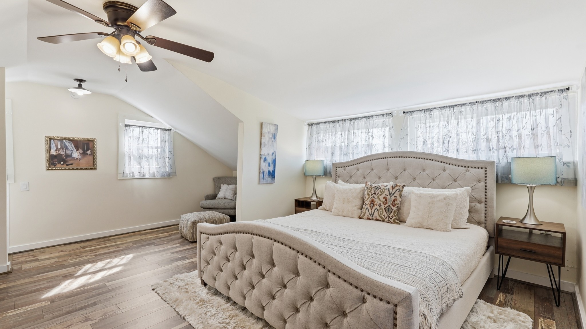 2820 Lockertsville Road Ashland City, TN 37015 - Photo 36 of 47 a bedroom with a bed and a chandelier