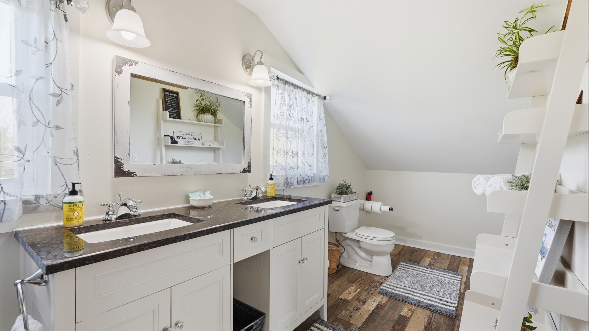 2820 Lockertsville Road Ashland City, TN 37015 - Photo 41 of 47 a bathroom with a granite countertop sink mirror and a toilet