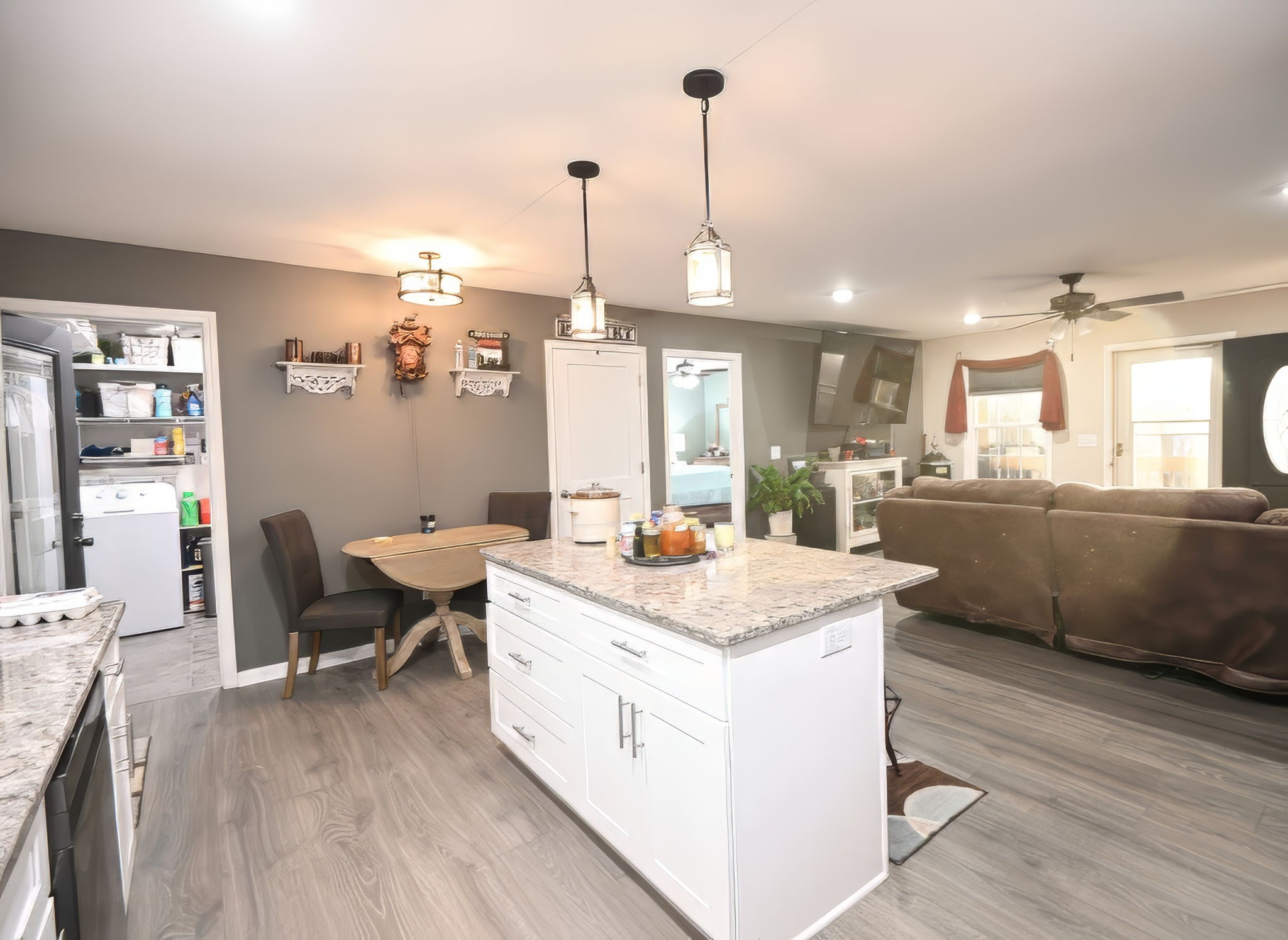 14 Lost Creek Road Carthage, TN 37030 - Photo 12 of 28 a kitchen island with stainless steel appliances granite countertop a sink stove and wooden floor