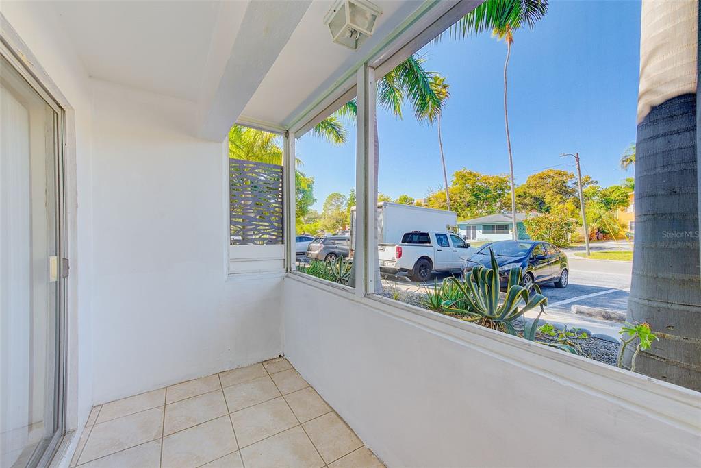 1329 Drew Street, Unit 4 Clearwater, FL 33755 - Photo 19 of 34 a view of a porch with furniture