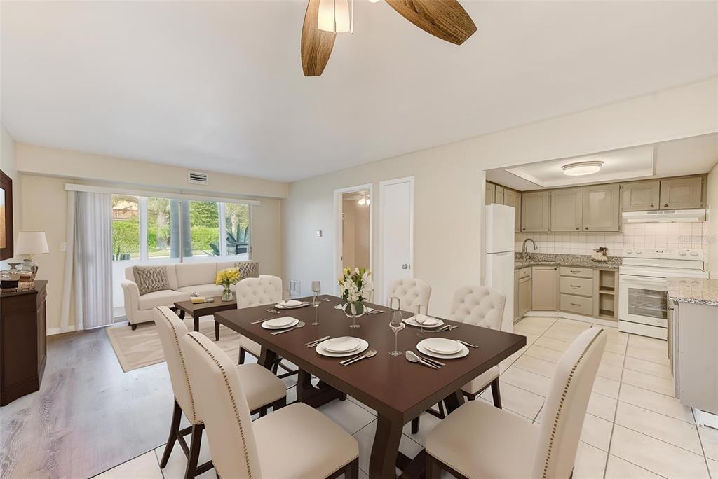 1329 Drew Street, Unit 4 Clearwater, FL 33755 - Photo 2 of 34 a view of a dining room with furniture and wooden floor