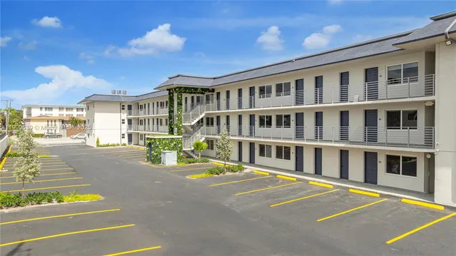 a front view of a building with street view