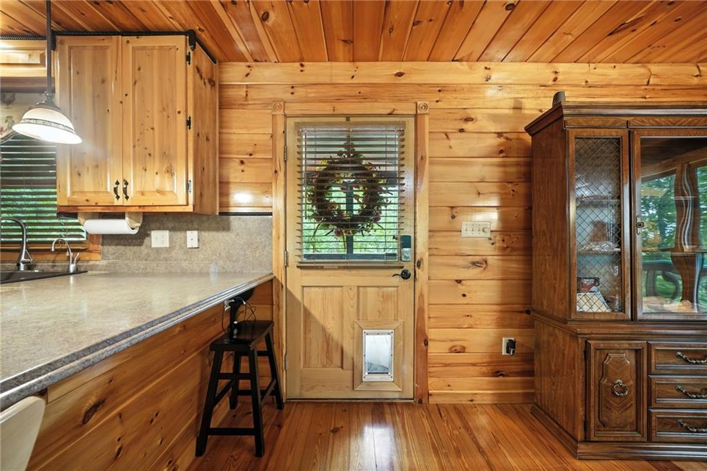 59 Bear Track Trail Morganton, GA 30560 - Photo 11 of 37 a kitchen with a wooden floor and a sink