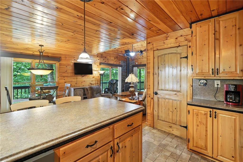 59 Bear Track Trail Morganton, GA 30560 - Photo 20 of 37 a kitchen with stainless steel appliances a sink and refrigerator
