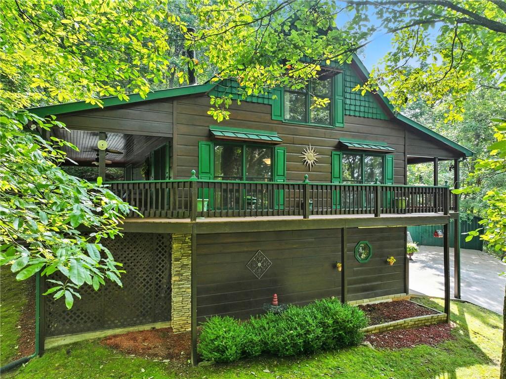 59 Bear Track Trail Morganton, GA 30560 - Photo 31 of 37 a front view of a house with a garden