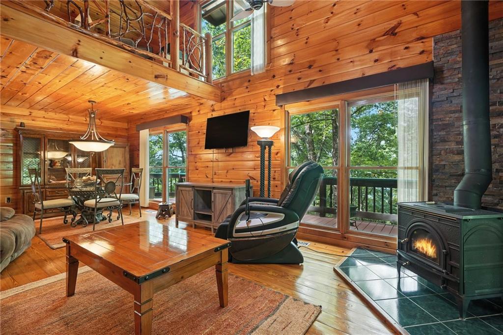 59 Bear Track Trail Morganton, GA 30560 - Photo 5 of 37 a living room with fireplace furniture and a large window