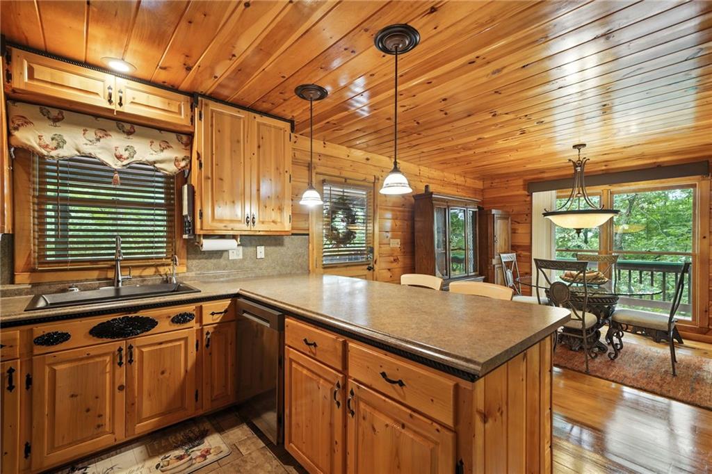 59 Bear Track Trail Morganton, GA 30560 - Photo 9 of 37 a kitchen with a sink window and cabinets