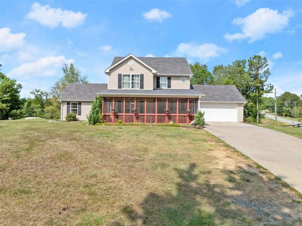 3210 Tanners Mill Road Gainesville, GA 30507 - Photo 1 of 1 a front view of a house with a yard