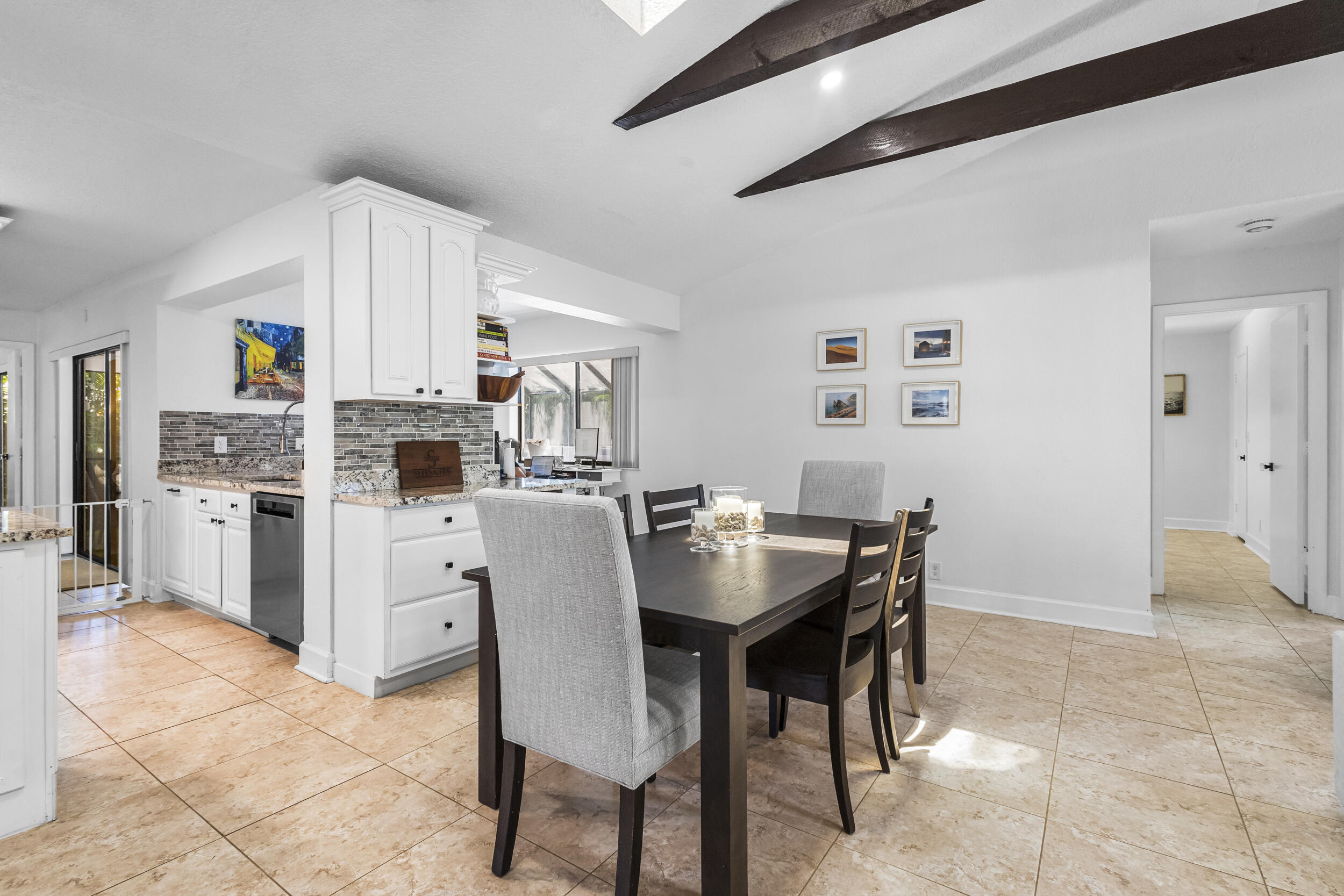 1948 Southwest 36th Avenue Delray Beach, FL 33445 - Photo 11 of 40 a view of a dining room with furniture