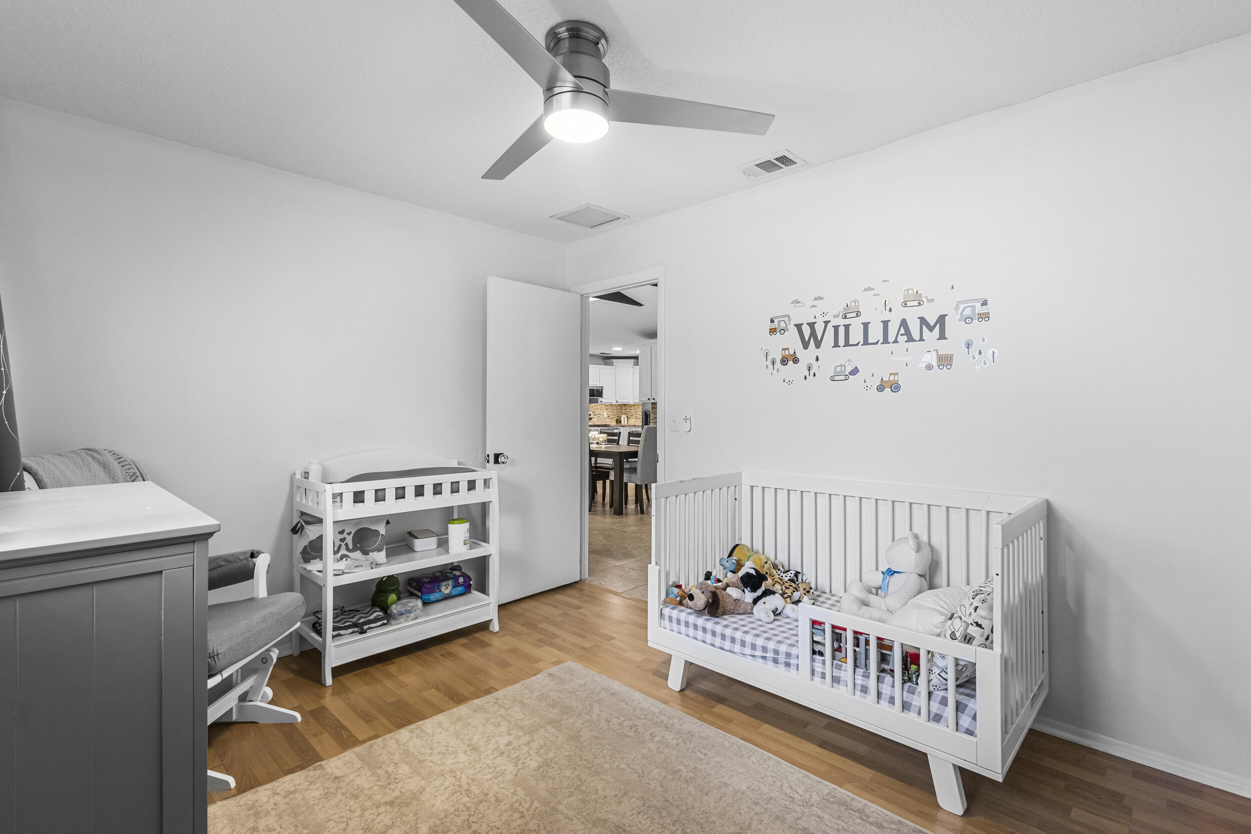 1948 Southwest 36th Avenue Delray Beach, FL 33445 - Photo 31 of 40 a view of a room with baby toys