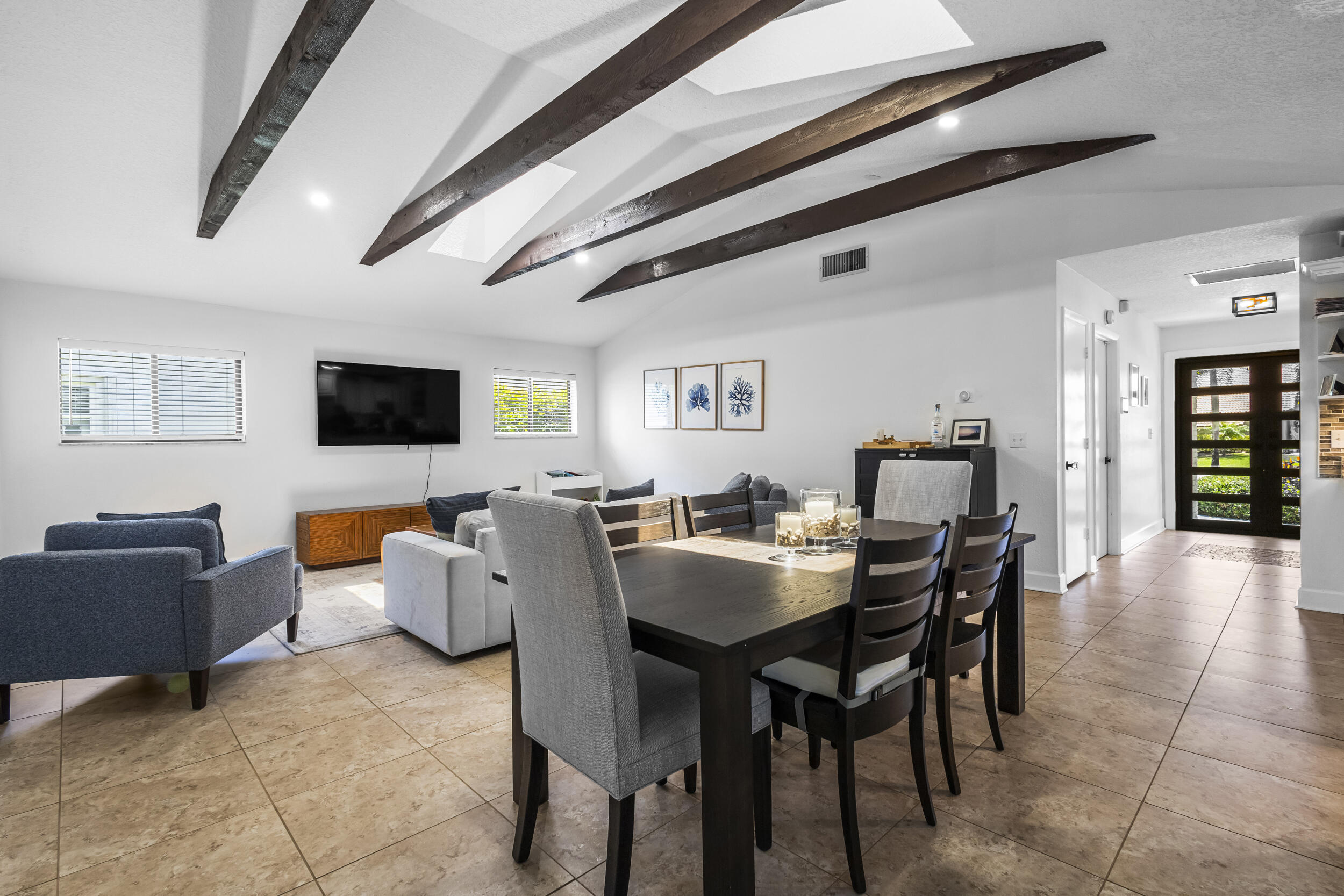 1948 Southwest 36th Avenue Delray Beach, FL 33445 - Photo 8 of 40 a view of a dining room with furniture