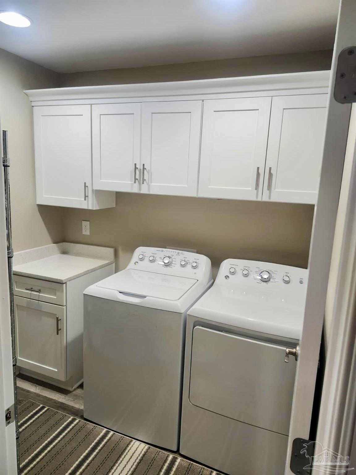 10425 Tanton Road Pensacola, FL 32506 - Photo 11 of 14 a utility room with dryer and washer