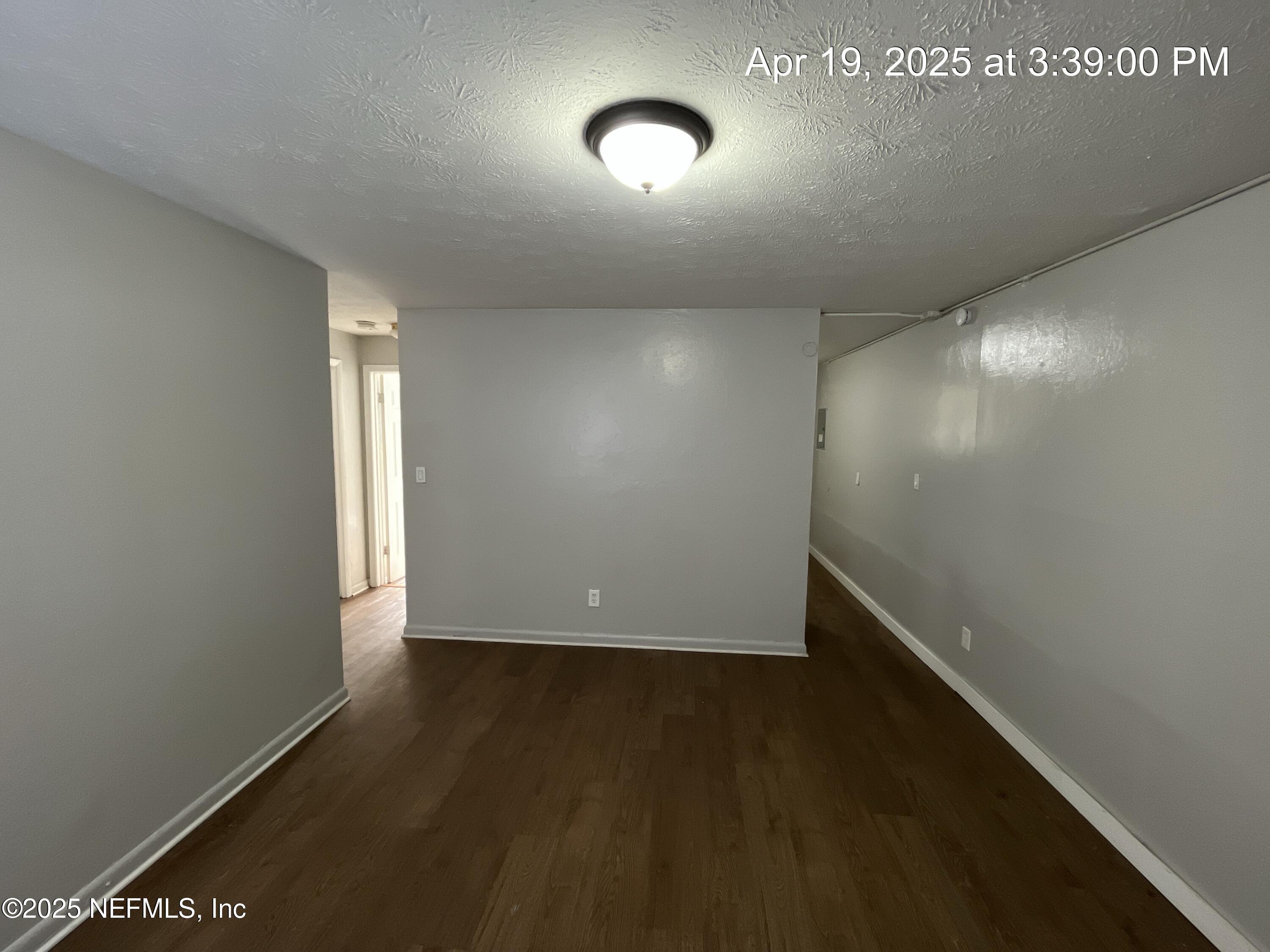 1616 West 36th Street Jacksonville, FL 32209 - Photo 7 of 7 a view of an empty room with wooden floor