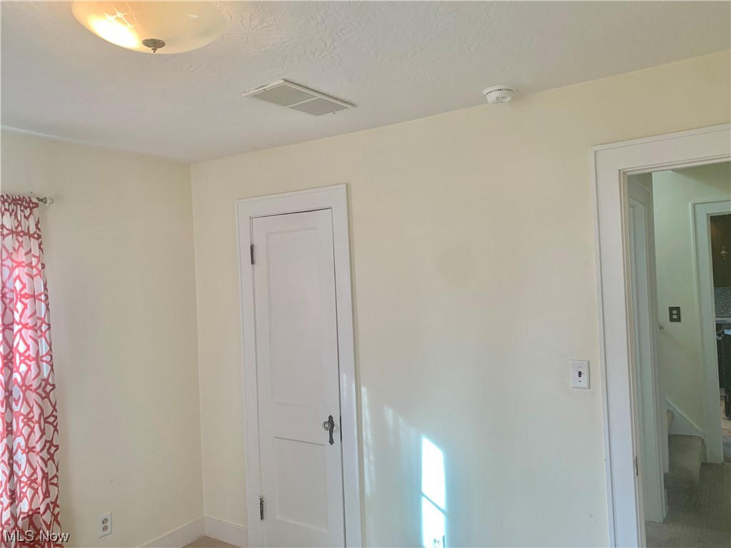 410 Rosedale Street Ravenna, OH 44266 - Photo 14 of 35 First floor bedroom and closet