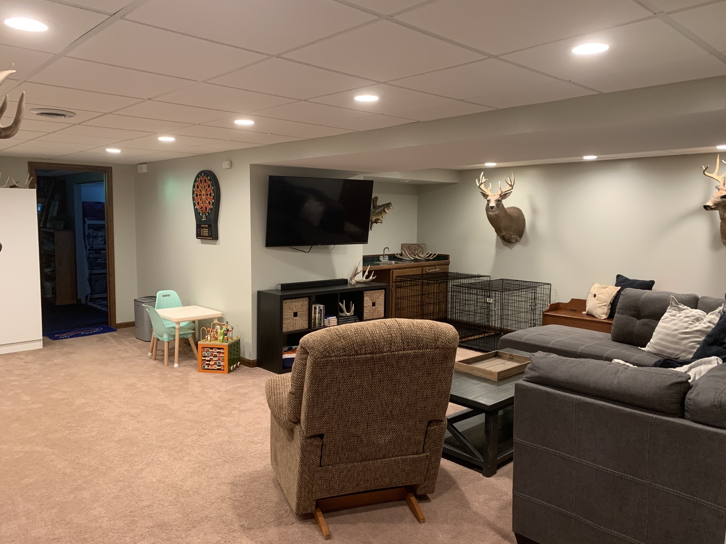 29060 Moose Range Road Sycamore, IL 60178 - Photo 17 of 28 a living room with furniture and a flat screen tv
