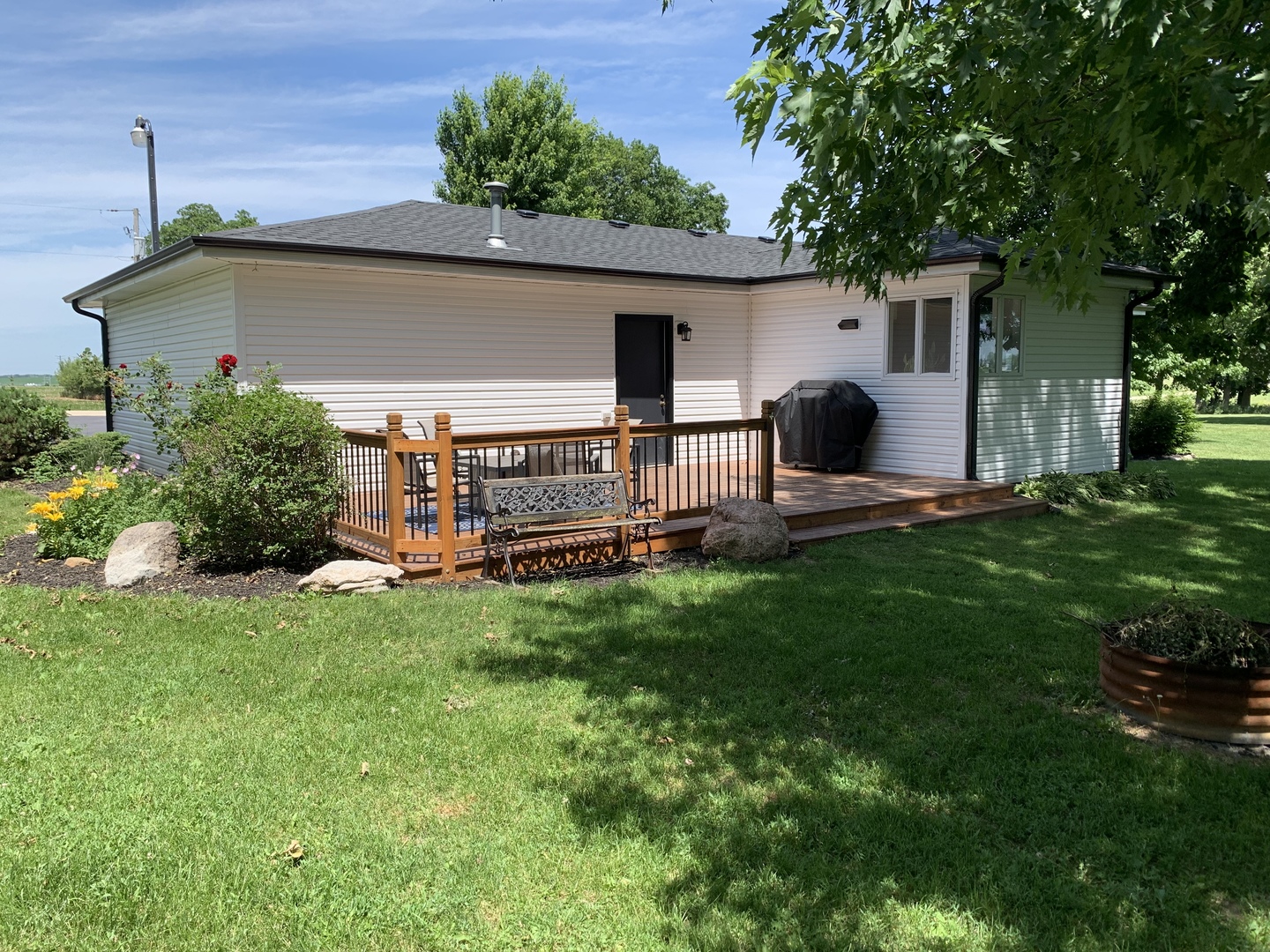 29060 Moose Range Road Sycamore, IL 60178 - Photo 24 of 28 a view of a house with backyard and sitting area