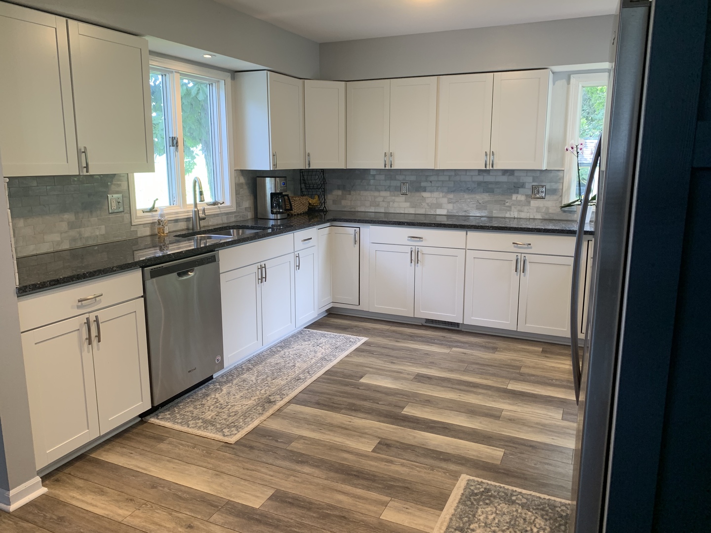 29060 Moose Range Road Sycamore, IL 60178 - Photo 5 of 28 a kitchen with granite countertop cabinets sink and window
