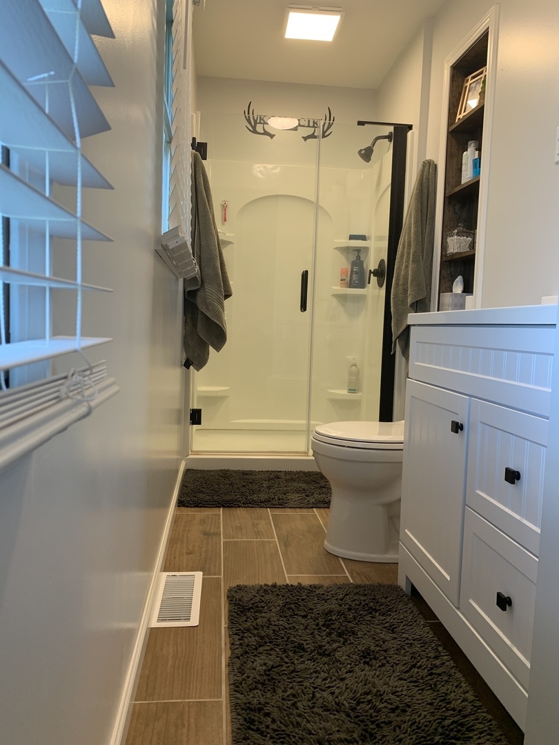29060 Moose Range Road Sycamore, IL 60178 - Photo 9 of 28 a bathroom with a sink and a shower