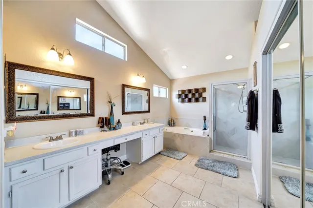 a view of a backyard with sitting area