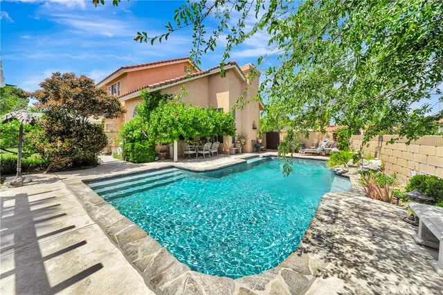 a house view with a outdoor space