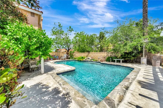 a view of a house with a yard and plants