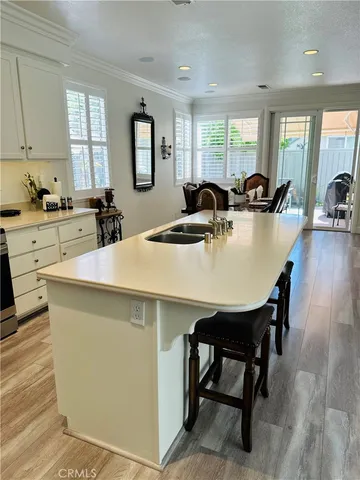 a view of a dining room with furniture and window