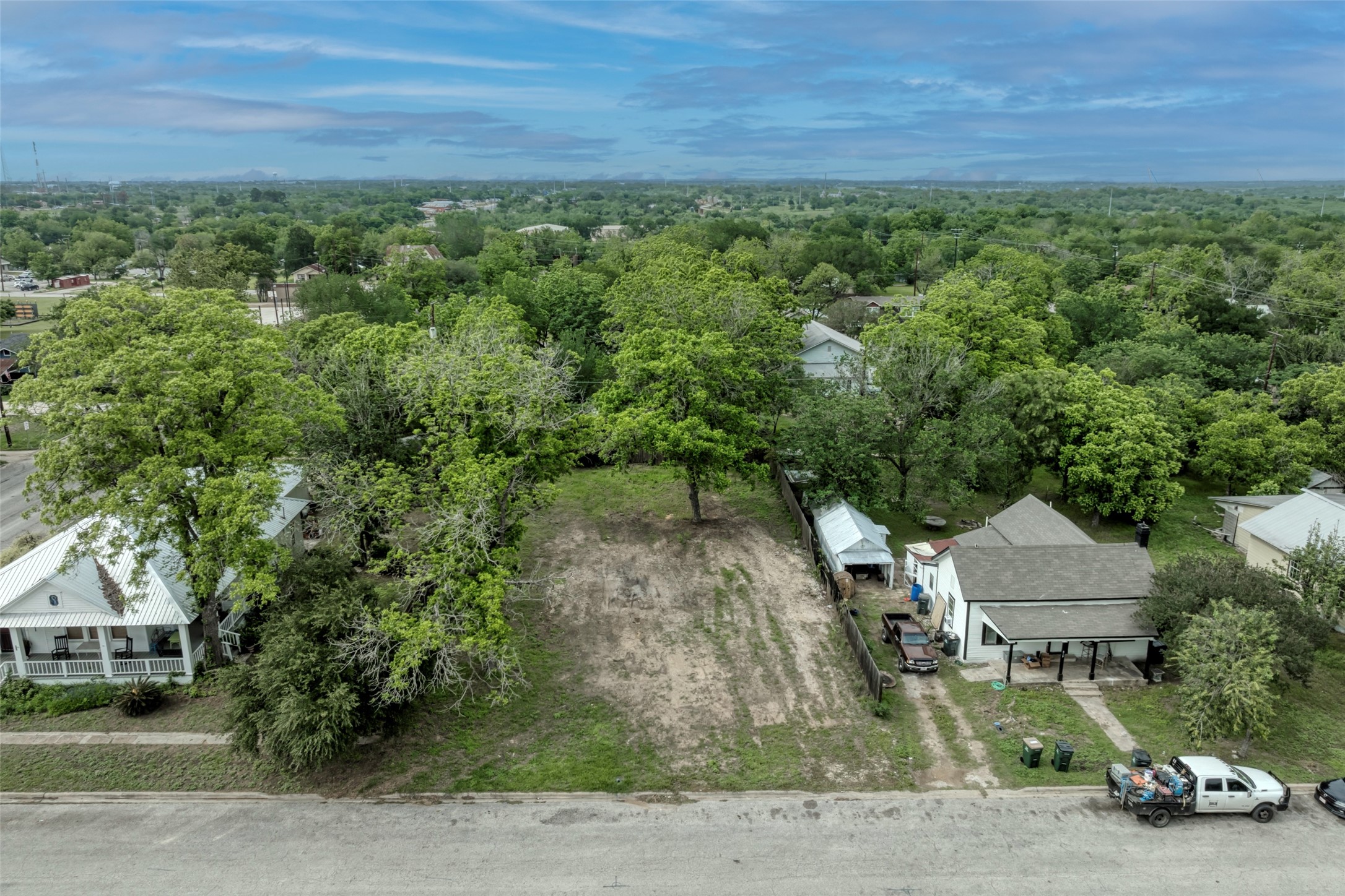 809 East Fannin Street Luling, TX 78648 - Photo 6 of 16 an aerial view of a house with a yard