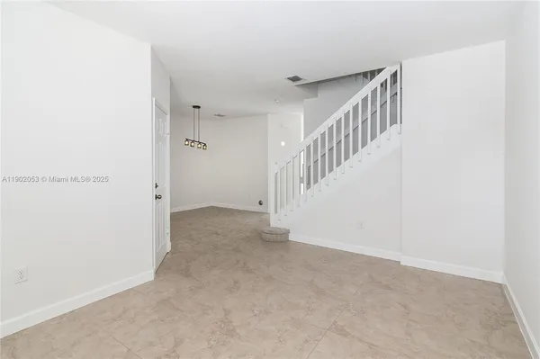 a view of an entryway with staircase