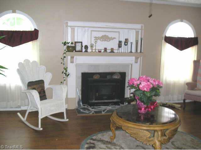 1513 East Fairfield Road High Point, NC 27263 - Photo 3 of 9 Other. Living Room offers a Fireplace w/woodstove, Arches over the Windows....