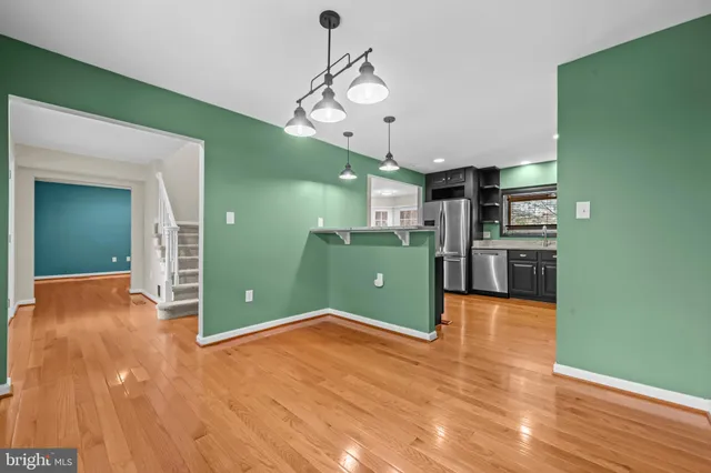 a view of a kitchen with furniture and a kitchen