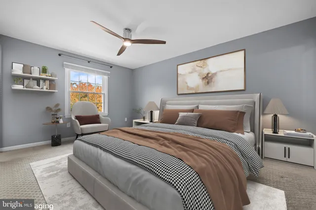 a bedroom with bed and window