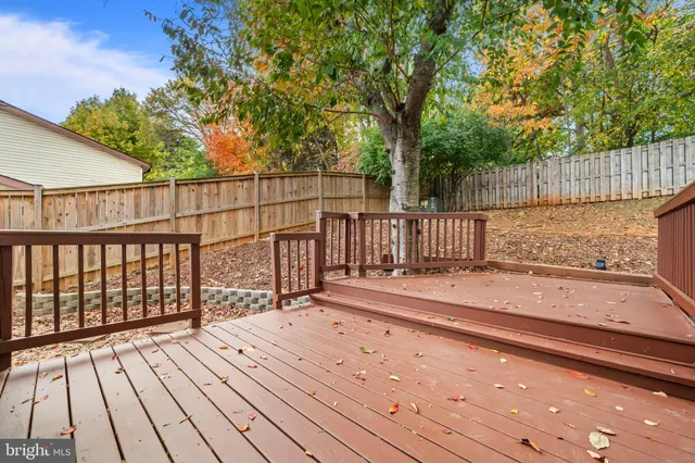 a view of a wooden floor with a bench