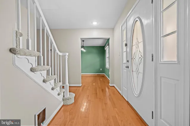 a view of a staircase with wooden floor and stairs