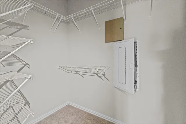 a view of small space with racks on the wall
