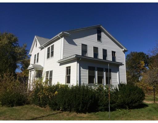 28 Rawson Avenue Lexington, MA 02420 - Photo 1 of 4 a front view of a house with a yard