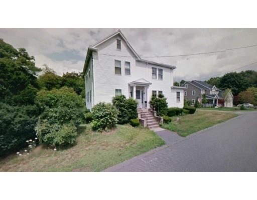 28 Rawson Avenue Lexington, MA 02420 - Photo 2 of 4 a black and white photo of a house