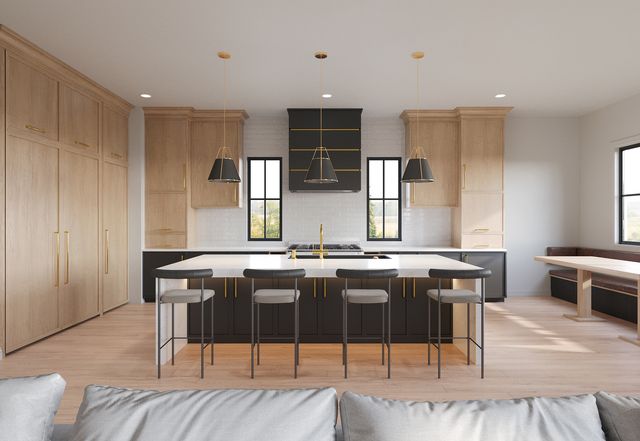 a kitchen with a table chairs sink and wooden floor