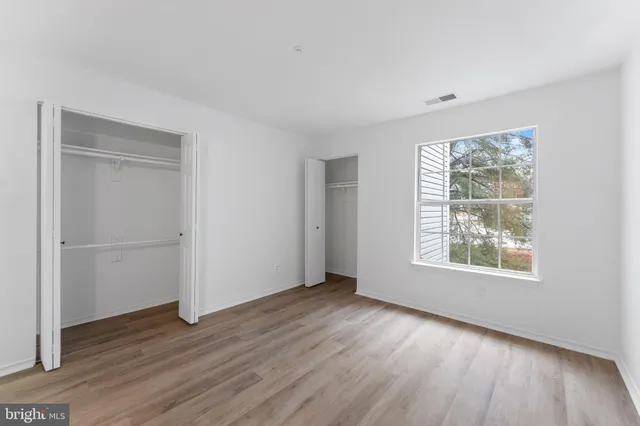 a view of a balcony with furniture