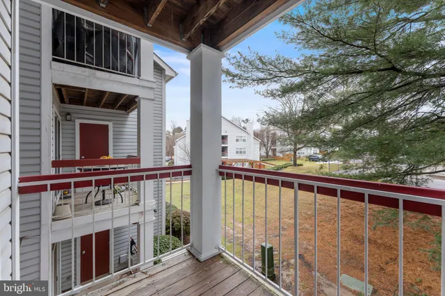 a view of a backyard with sitting area