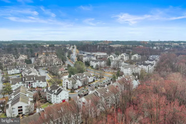 a view of a backyard with sitting area