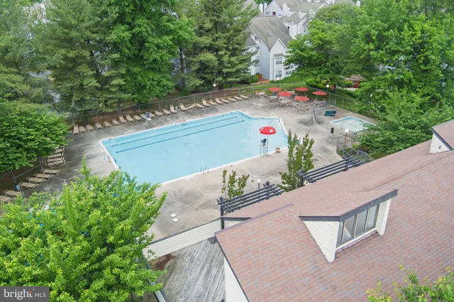 a view of a park with swings and slides