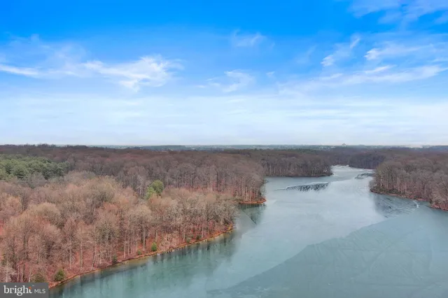 a view of a cars parked on the side of a street