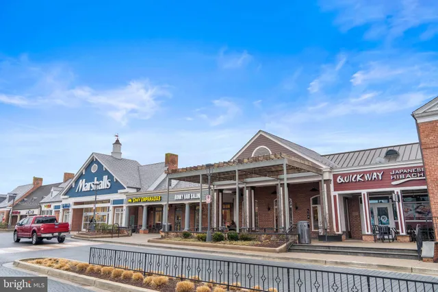 a view of a building with a entrance gate