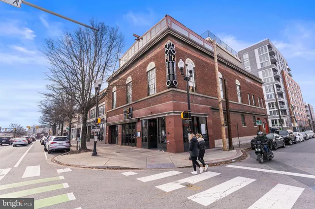 a view of a building with a street