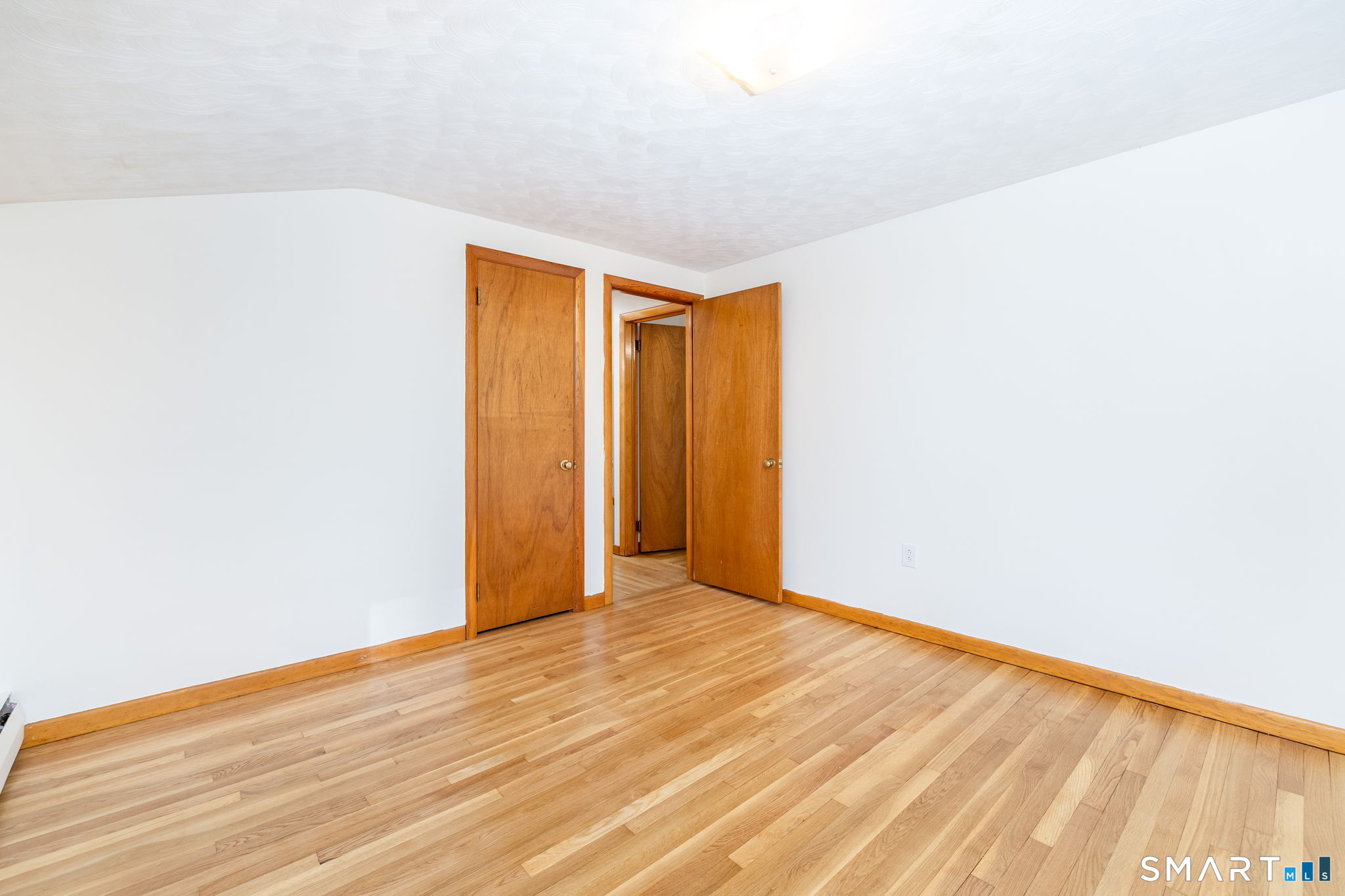 50 Brook Road Enfield, CT 06082 - Photo 20 of 34 a view of empty room with wooden floor