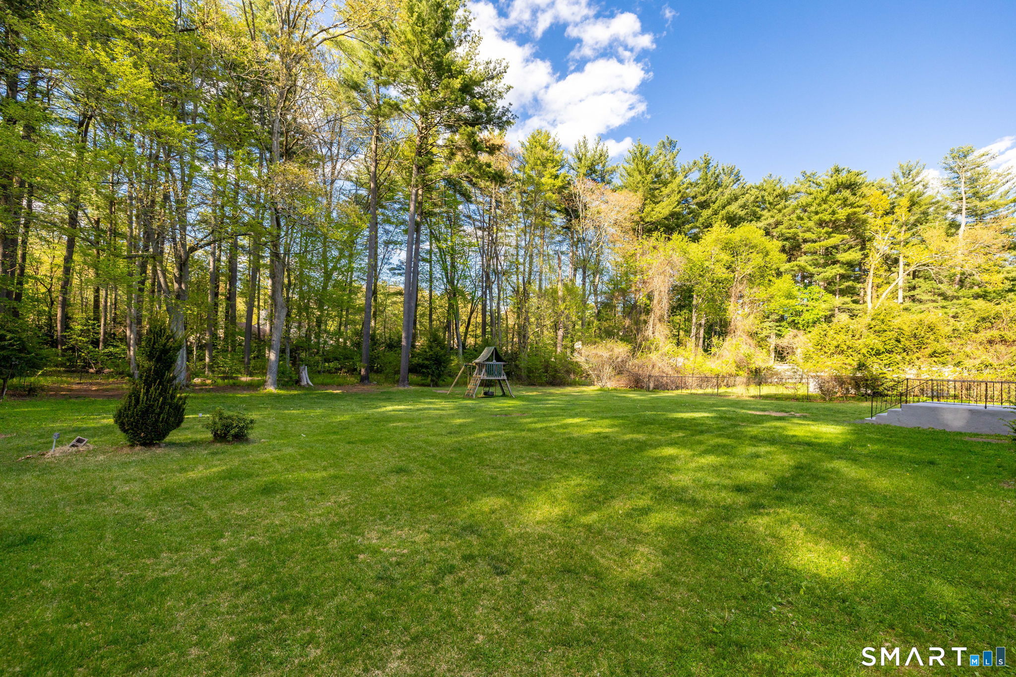 50 Brook Road Enfield, CT 06082 - Photo 3 of 34 a view of yard with green space