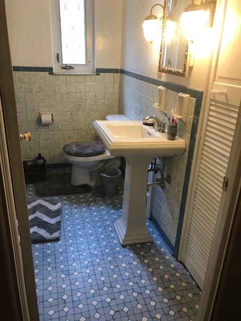 22 Seneca Road Pittsburgh, PA 15241 - Photo 13 of 24 Bathroom with ceramic tile floor, linen closet, and a tub and shower.