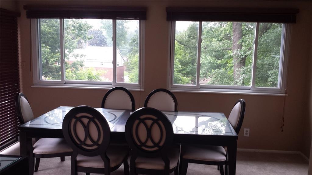 22 Seneca Road Pittsburgh, PA 15241 - Photo 9 of 24 Dining rooms/Sun room overlooks the back yard.