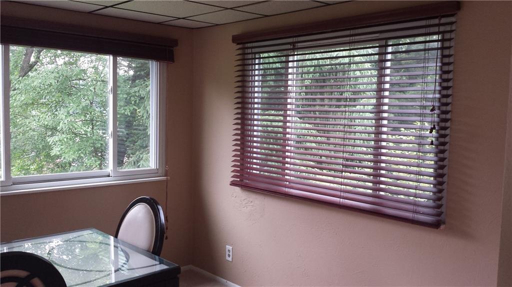 22 Seneca Road Pittsburgh, PA 15241 - Photo 10 of 24 Dining roon/Sun room with blinds on all windows and 2 sliding glass doors.