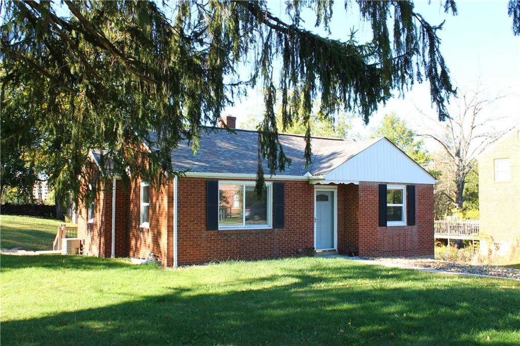 8149 Peebles Road Pittsburgh, PA 15237 - Photo 1 of 36 a view of a house with a yard